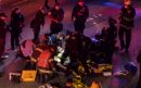 Protester killed and another fighting for life after car hits Seattle march