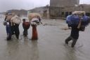 Flash floods triggered by rain kill 15 people in NW Pakistan