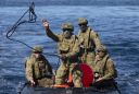 Australian navy ship tows unexploded bomb out to sea